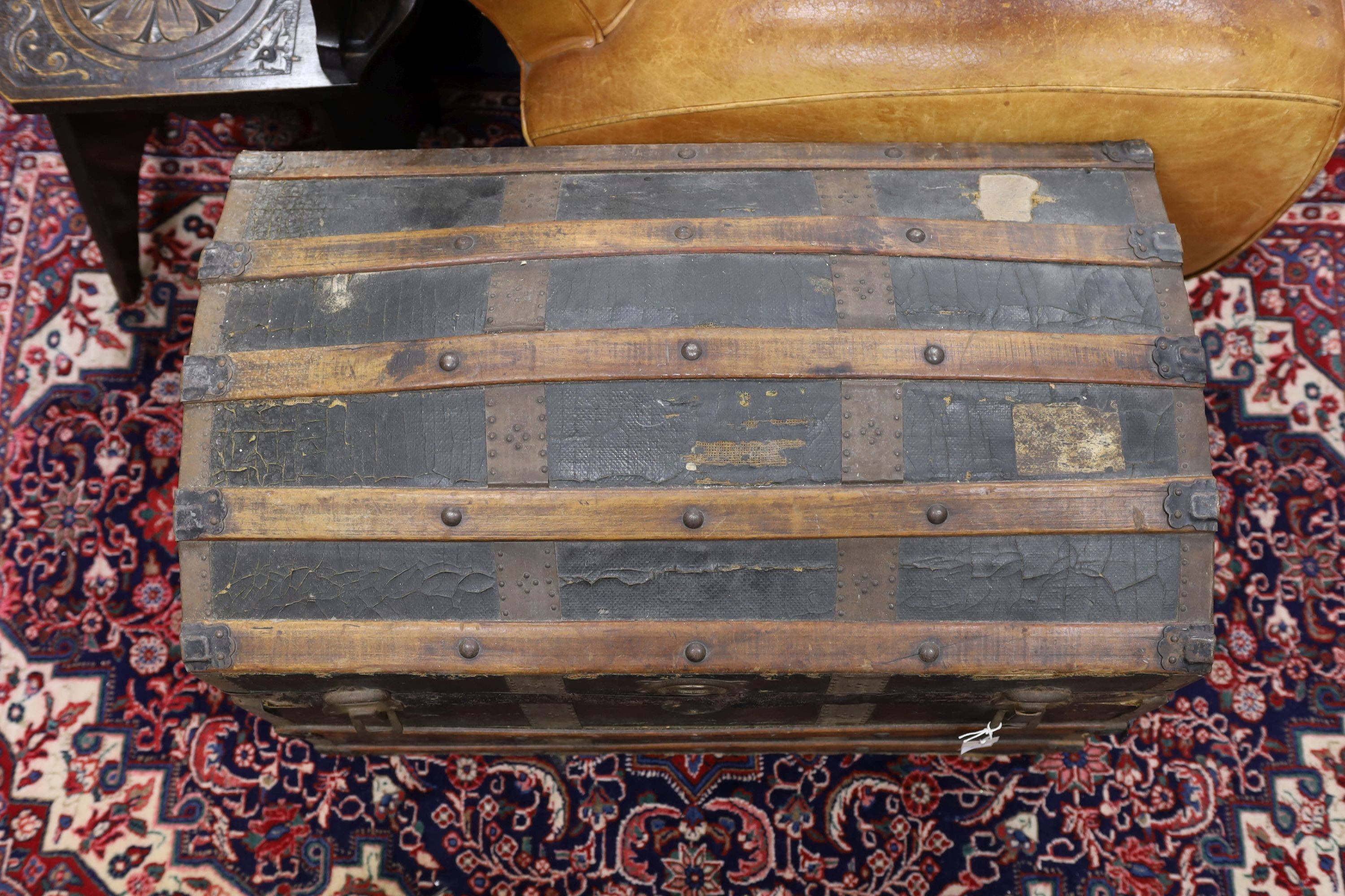 A late Victorian wood bound domed camphorwood and canvas covered trunk, length 85cm, depth 50cm, height 59cm